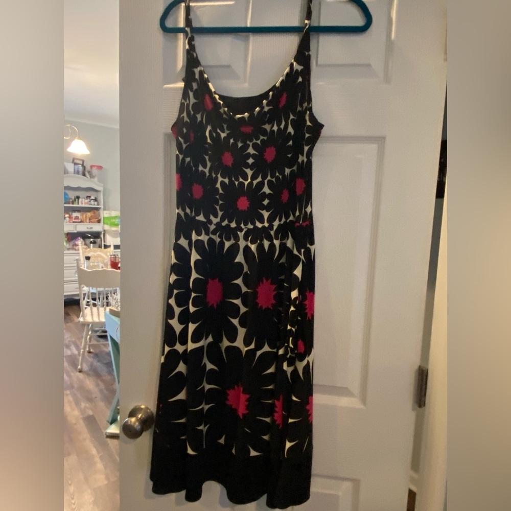 Black sleeveless dress with pink and white flowers